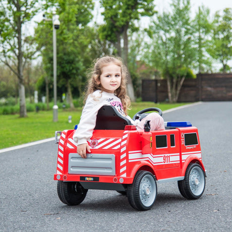 12V Kids Fire Truck Ride-On – Red children's electric car with emergency lights, megaphone, fire shovel, and sprinkler, designed for kids aged 3-8. Back view with kid sitting inside.