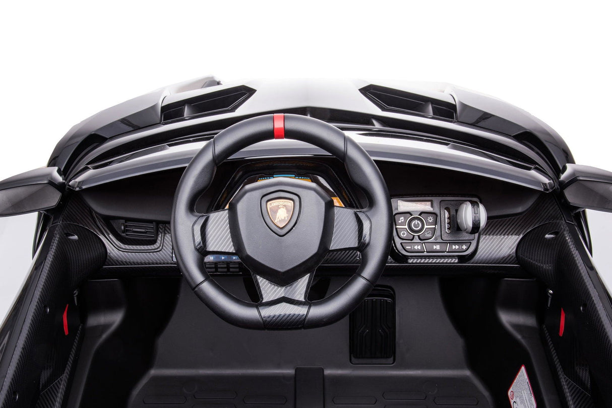 24V Kids Car Lamborghini Veneno – A sleek, black children's electric car with two seats, EVA tires, and a realistic sports car design for kids aged 3-8 - View of the dashboard.