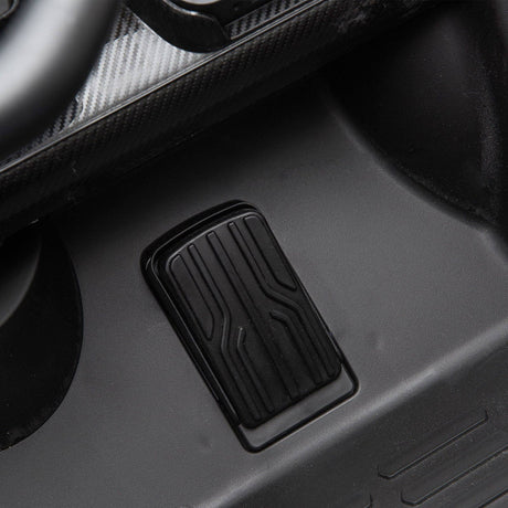 24V Kids Car Lamborghini Veneno – A sleek, black children's electric car with two seats, EVA tires, and a realistic sports car design for kids aged 3-8 - close up view of pedal.