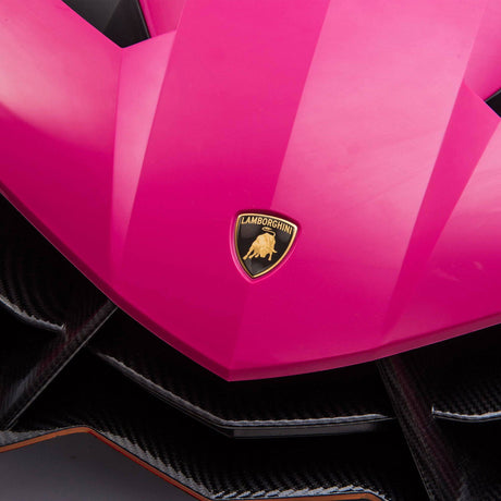 24V Kids Car Lamborghini Veneno – A sleek, black children's electric car with two seats, EVA tires, and a realistic sports car design for kids aged 3-8 - view of Lamborghini emblem on pink Lamborghini. 