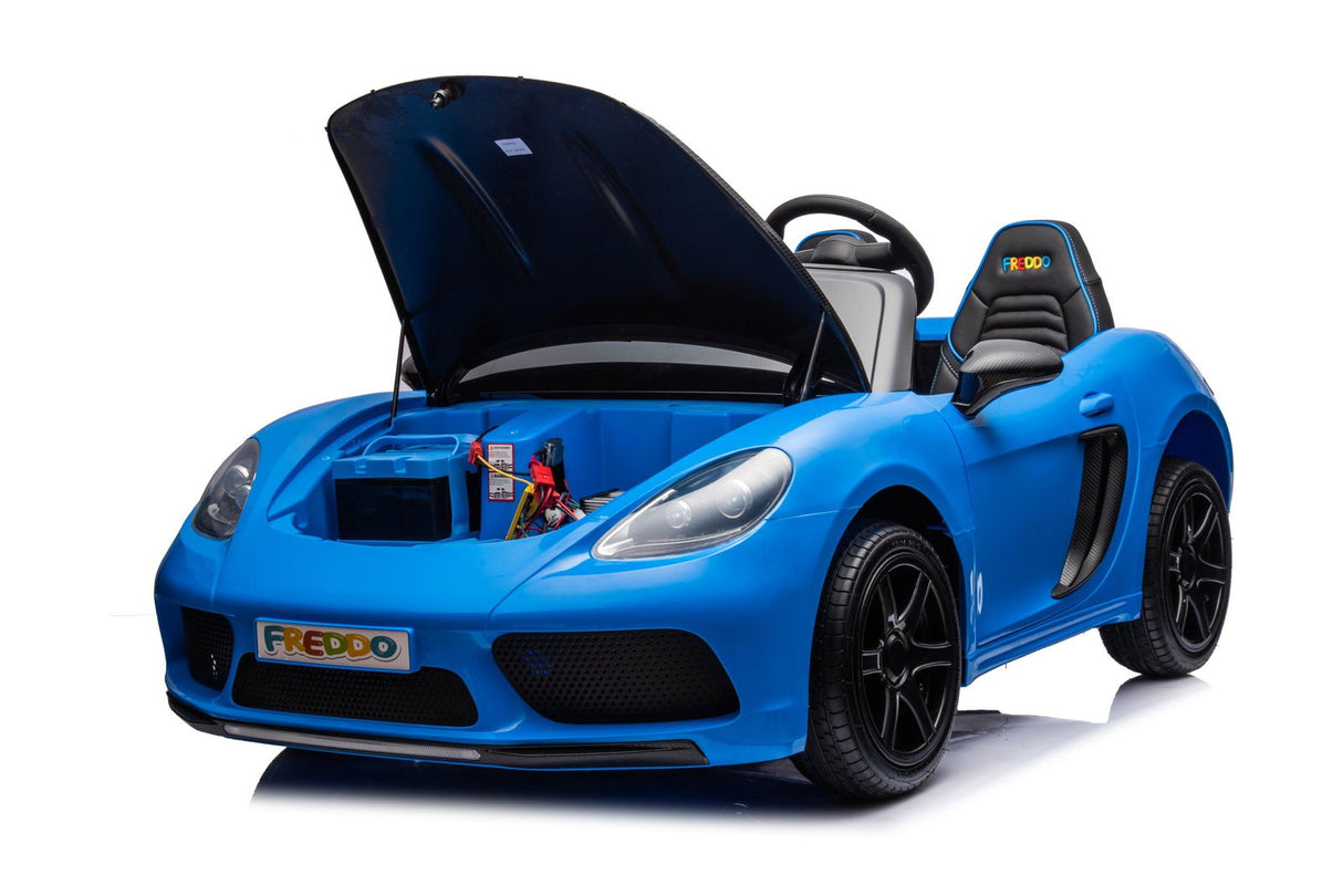 48V Turbo Racer Kids Electric Car – A high-speed, two-seater children's ride-on with a 600W motor, leather seats, LED lights, and all-terrain air tires - front side view with open hood of blue turbo racer.