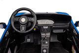 48V Turbo Racer Kids Electric Car – A high-speed, two-seater children's ride-on with a 600W motor, leather seats, LED lights, and all-terrain air tires - view of the dashboard.