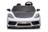 48V Turbo Racer Kids Electric Car – A high-speed, two-seater children's ride-on with a 600W motor, leather seats, LED lights, and all-terrain air tires - front view of white turbo racer.