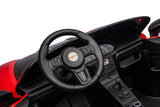 48V Turbo Racer Kids Electric Car – A high-speed, two-seater children's ride-on with a 600W motor, leather seats, LED lights, and all-terrain air tires - steering wheel of red turbo racer.