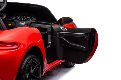 48V Turbo Racer Kids Electric Car – A high-speed, two-seater children's ride-on with a 600W motor, leather seats, LED lights, and all-terrain air tires - view of open door.