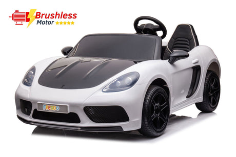 48V Turbo Racer Kids Electric Car – A high-speed, two-seater children's ride-on with a 600W motor, leather seats, LED lights, and all-terrain air tires - side front view of white turbo racer with brushless motors.