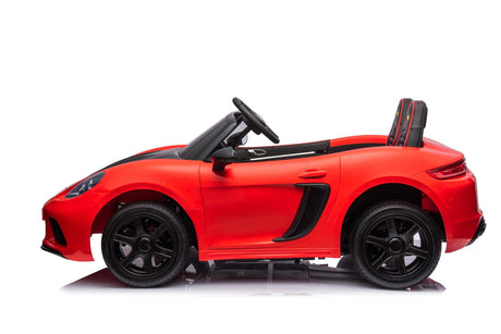 48V Turbo Racer Kids Electric Car – A high-speed, two-seater children's ride-on with a 600W motor, leather seats, LED lights, and all-terrain air tires - side view of red turbo racer.